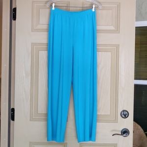 Slinky turquoise stretch pant.